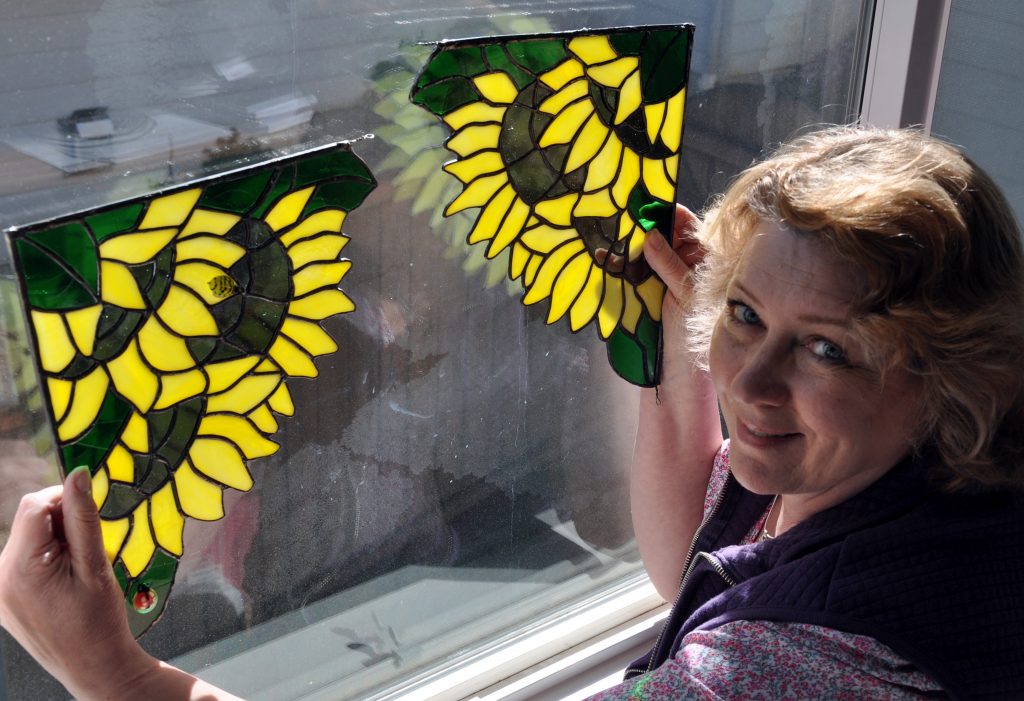 sunflower corners -- with a couple of bees